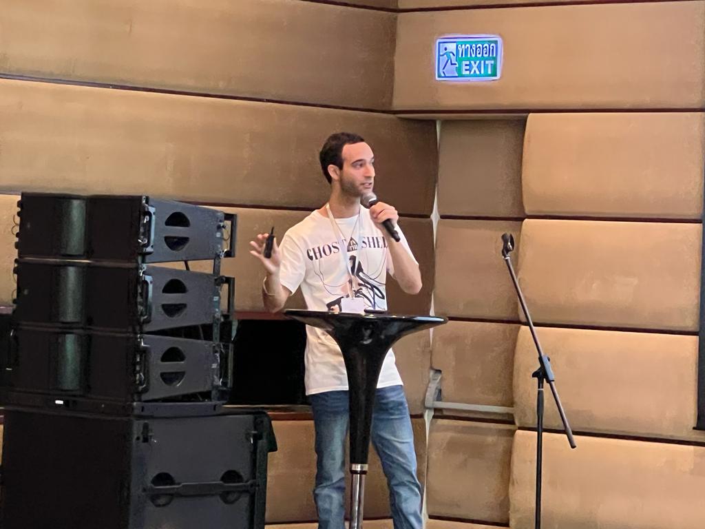 David speaking at conference